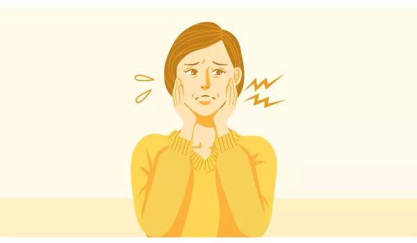 イラスト：痛みを覚えている女性